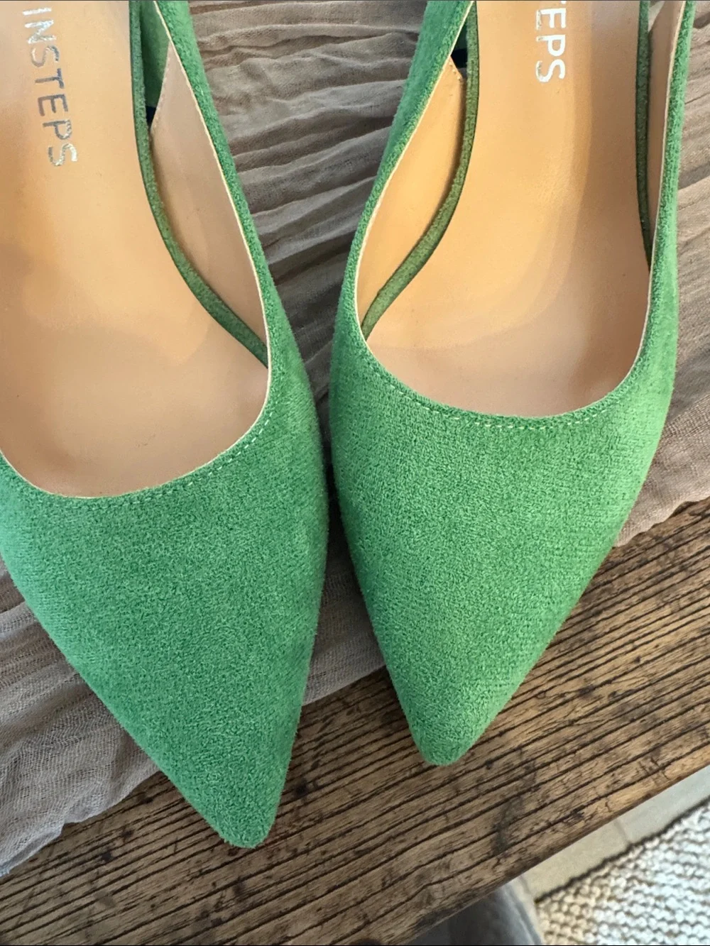 Moving Steps Green sued pumps with block heels.